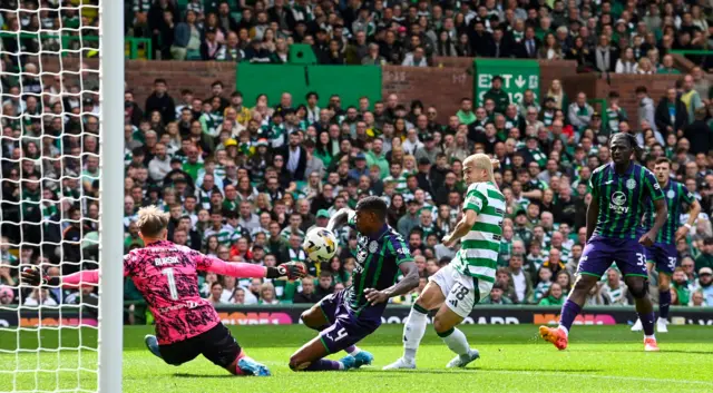 Daizen Maeda scores Celtic's opening goal against Hibernian at Celtic Park