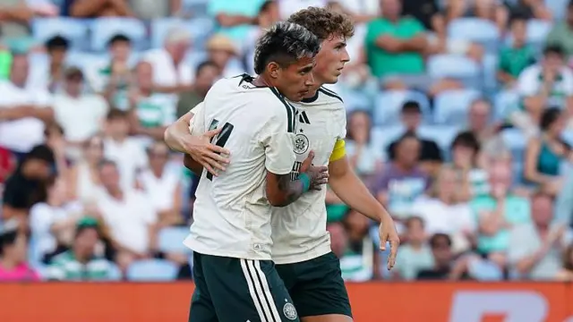 Camilo Duran celebrates with Arne Engels