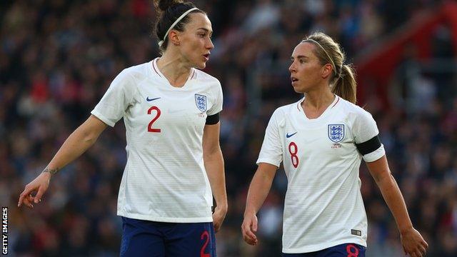 Lucy Bronze and Jordan Nobbs playing for England