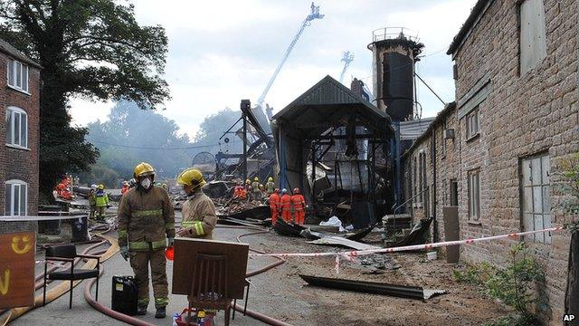 Search and rescue teams from all emergency services search the scene of an explosion