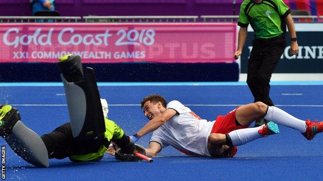 England's Harry Martin scores