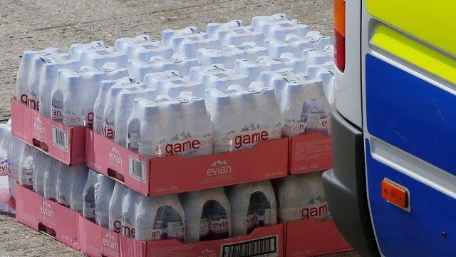 Water is unloaded for distribution to drivers on the M20