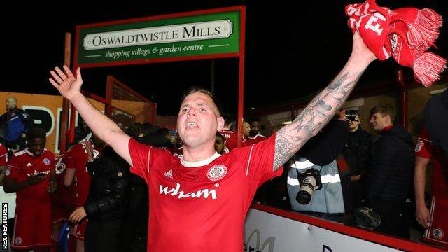 Billy Kee celebrates Accrington's promotion to League One in April 2018