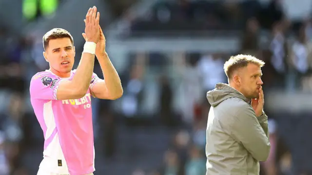 Jan Bednarek of Southampton applauds the fans.