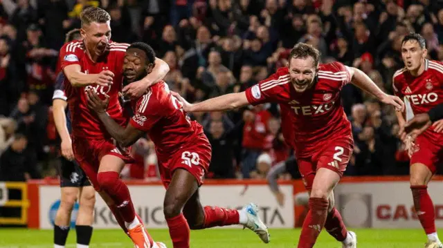 Aberdeen players celebrate
