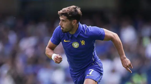 Pedro Neto running while playing for Chelsea