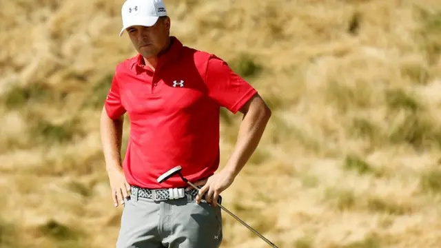 Jordan Spieth reacts to a putt