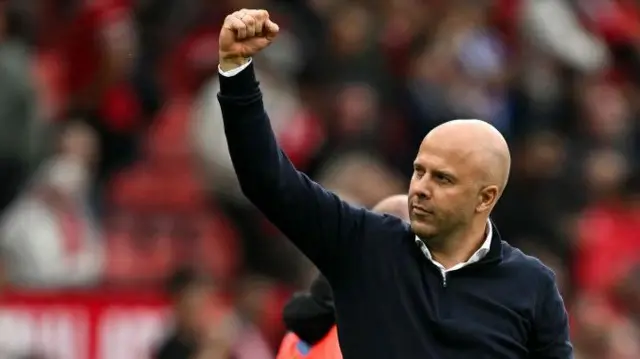 Liverpool manager Arne Slot celebrates after the Reds' win at Old Trafford. 