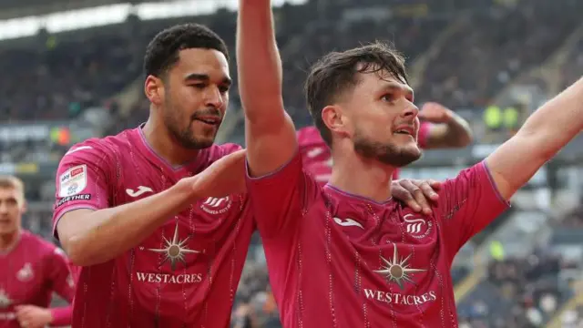 Liam Cullen celebrates with Ben Cabango 