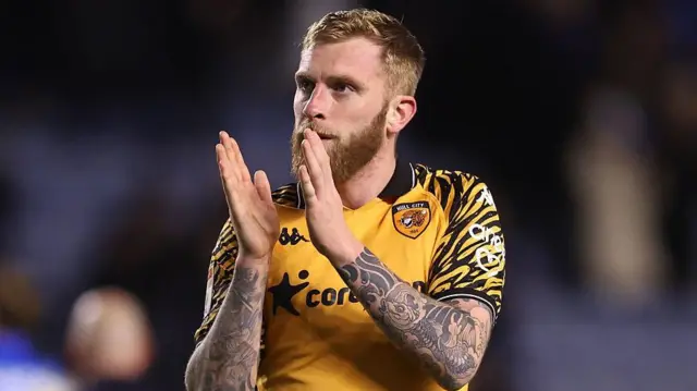 Oli McBurnie applauds fans 