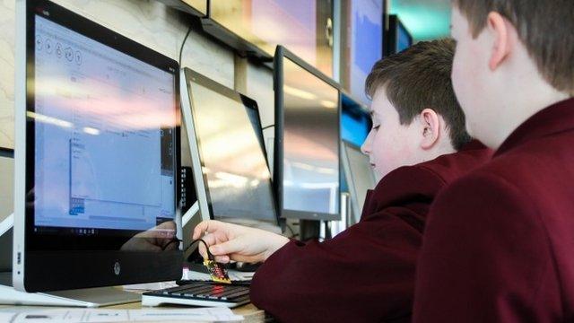 Boys using BBC Micro Bit