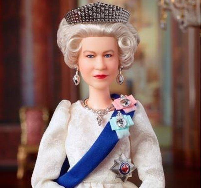 A close-up view of the Queen Elizabeth II barbie doll