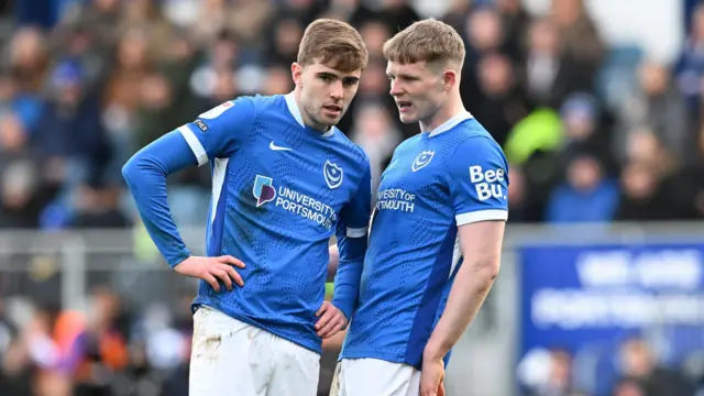 Zak Swanson (22) of Portsmouth and Terry Devlin (24) of Portsmouth during the EFL Sky Bet Championship match between Portsmouth and Sheffield United at Fratton Park