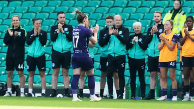 Hibs captain Joelle Murray being applauded off the pitch