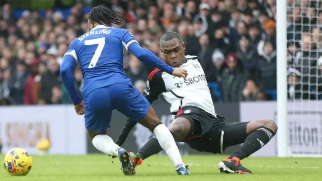 Fulham's Issa Diop fouls Raheem Sterling