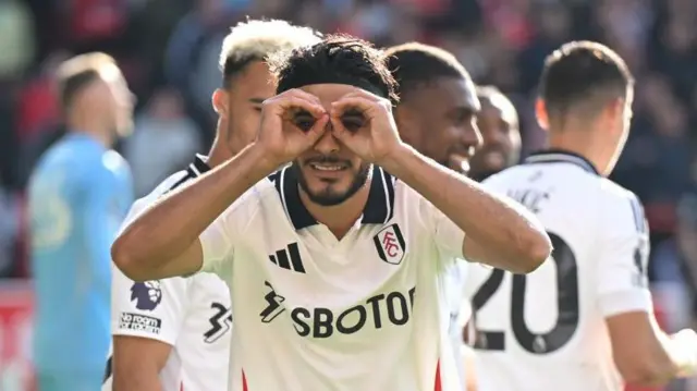 Raul Jimenez of Fulham celebrates after scoring his team's first goal from the penalty spot during the Premier League match between Nottingham Forest FC and Fulham FC at City Ground