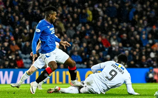 Rangers' Jose Cifuentes fouls Dundee's Amadou Bakayoko