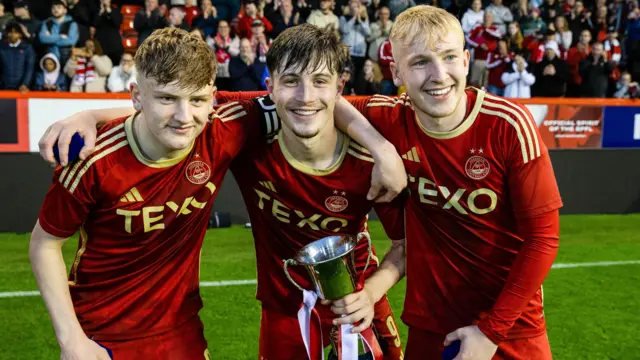 Alfie Stewart (L) and Alfie Bavidge (middle) won the Development League title with Aberdeen