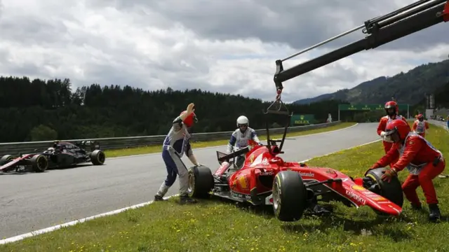 Kimi Raikkonen's Ferrari is picked up