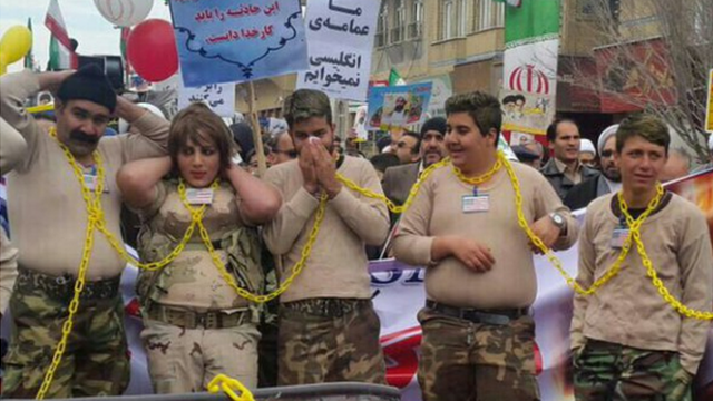 Iranians mock US captives in parade to mark revolution - BBC News