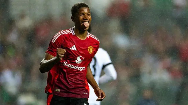 Chido Obi celebrates scoring against Hong Kong