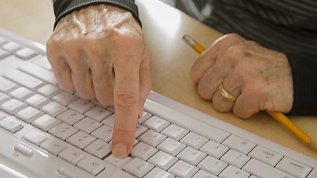 Pensioner using computer