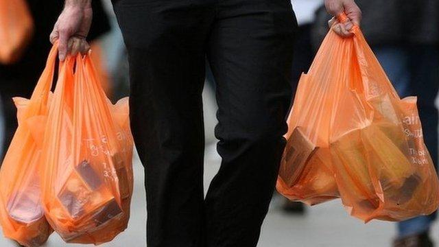 Shopper with carrier bags