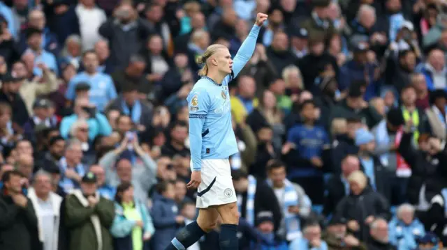 Erling Haaland of Manchester City celebrates scoring his team's first goal during the Premier League match between Manchester City FC and Arsenal FC at Etihad Stadium