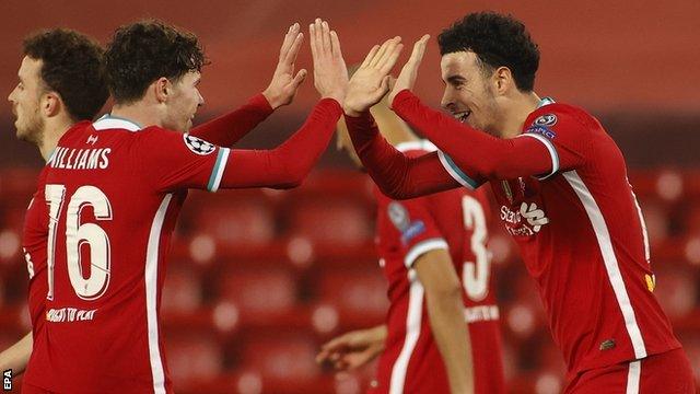 Neco Williams and Curtis Jones celebrate after the two 19-year-olds combined to give Liverpool the lead against Ajax in the Champions League at Anfield