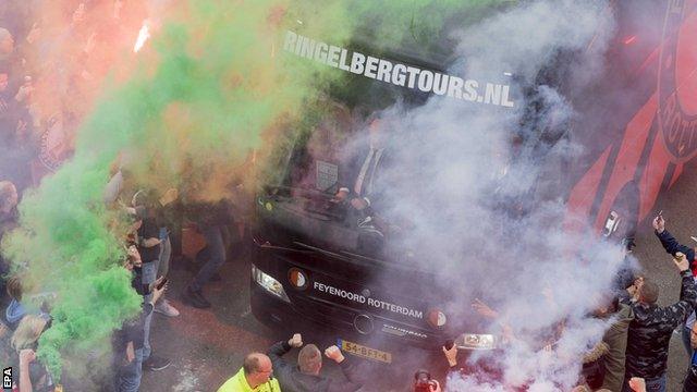 Feyenoord fans welcome the team bus to the game at Rotterdam rivals Excelsior