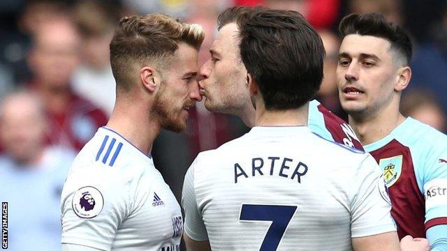 Burnley's Ashley Barnes kisses Joe Bennett after being fouled by his opponent