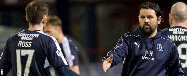 Dundee's Nick Ross is congratulated by manager Paul Hartley