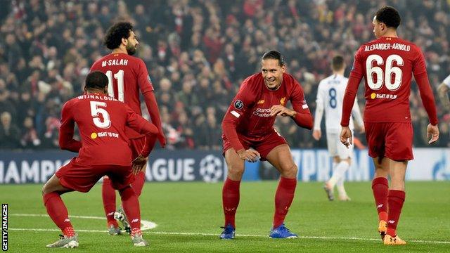 Georginio Wijnaldum and Virgil van Dijk celebrate