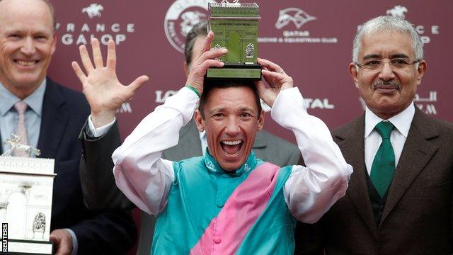 Frankie Dettori with the trophy following his victory.