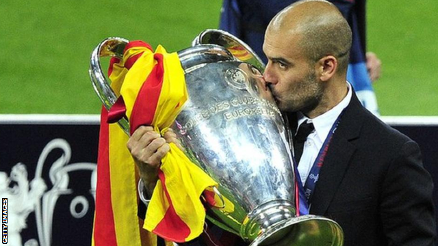 Pep Guardiola with the Champions League trophy after Barcelona beat Manchester United in 2011