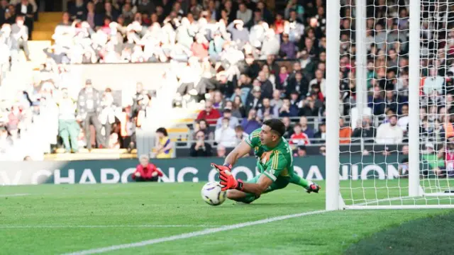 Emiliano Martinez saving a penalty for Aston Villa