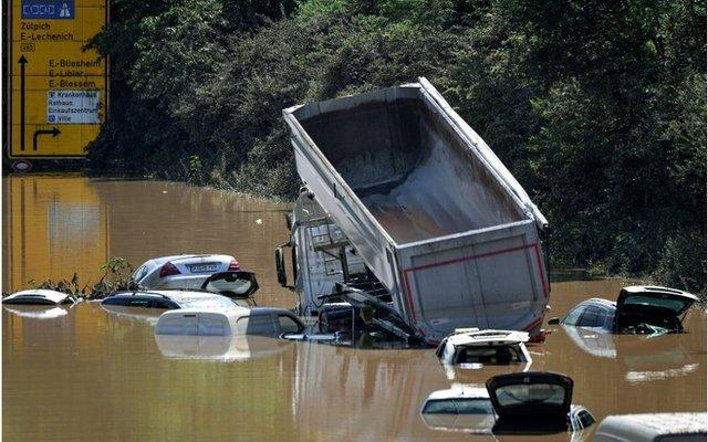 Wrecked cars and trucks on the B265 federal highway in Erftstadt, Germany