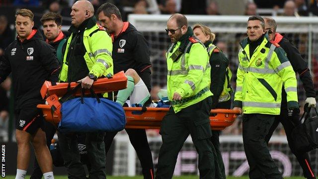 Adam Smith is taken off on a stretcher