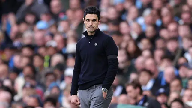 Mikel Arteta, manager of Arsenal looks on.