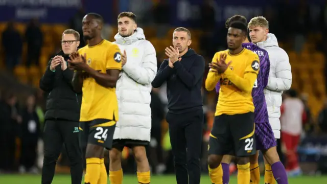 Gary O'Neil and Nelson Semedo applaud Wolves fans