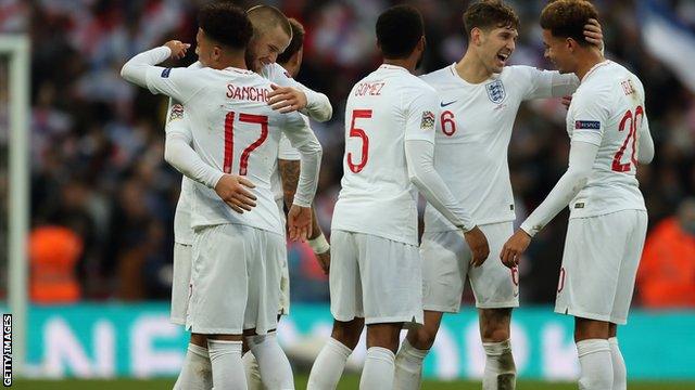 England celebrate a late victory over Croatia