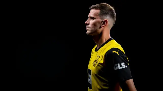 Pascal Gross poses after signing for Borussia Dortmund