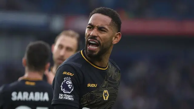 Matheus Cunha of Wolverhampton Wanderers goal celebration after scoring a goal to make the score 2-2 during the Premier League match between Brighton & Hove Albion FC and Wolverhampton Wanderers FC at Amex Stadium on October 26, 2024