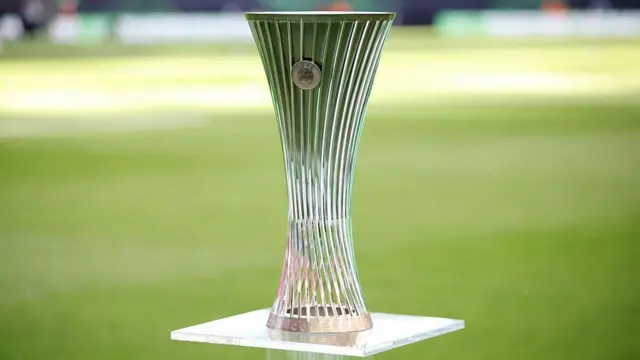 A detailed view of the UEFA Conference League trophy