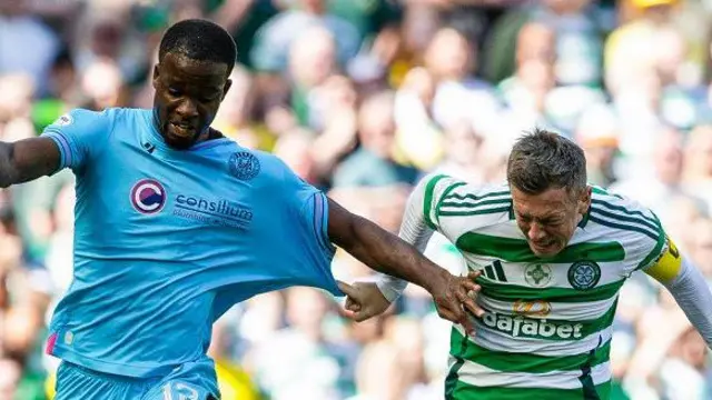 Celtic's Callum McGregor and St Mirren's Roland Idowu