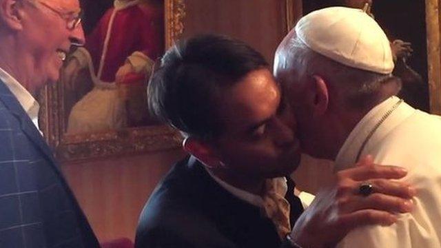 Pope Francis greets a gay couple, a former student and his boyfriend