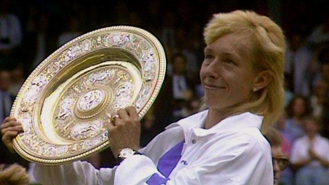 Navratilova lifting Wimbledon trophy