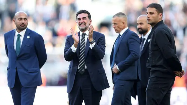  Newcastle co-owner Mehrdad Ghodoussi applauds fans