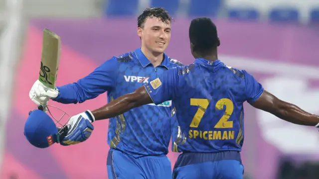 Tom Banton celebrates his century
