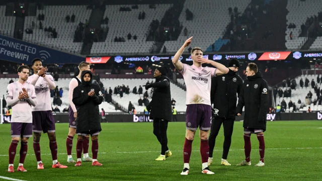 Brentford players celebrate at full time